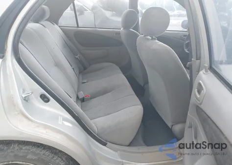 2001 Toyota Corolla Ce z USA, uszkodzony, nr VIN 1NXBR12E21Z473918